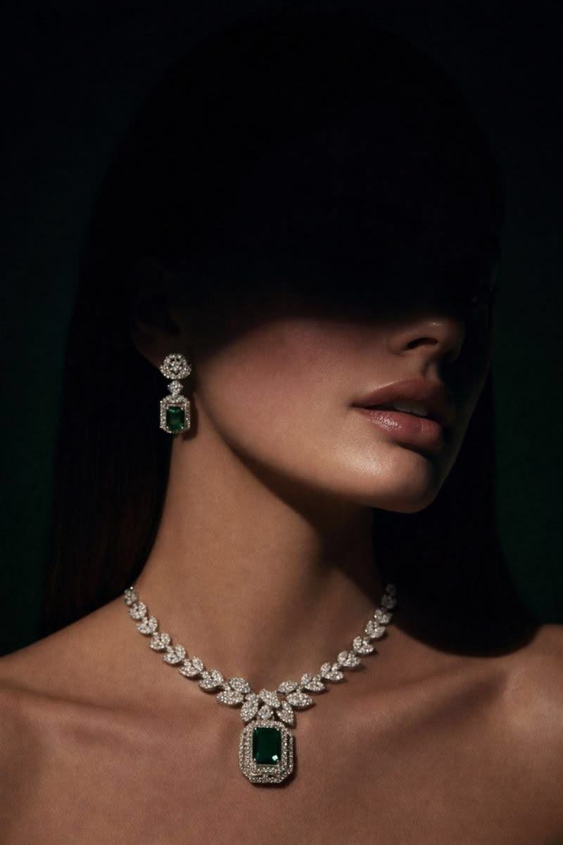 Emerald and diamond necklace with matching earrings