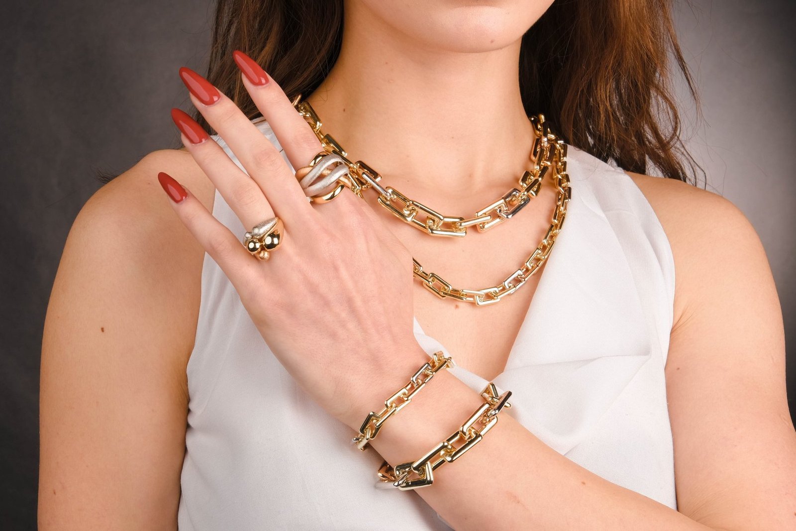 Gold chain necklaces, rings and bracelets